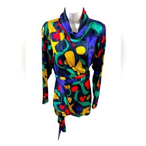 Ronny Kobo assymetric black multi- colo mini dress.
Size S